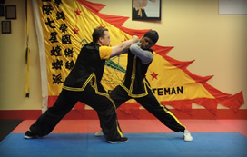 Sifu Winter and Craig demonstrating Shou Faat (hand technique)
